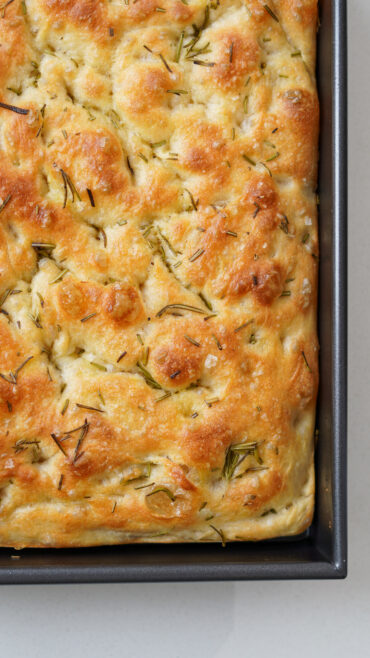 Freshly baked easy focaccia with rosemary and flaky salt
