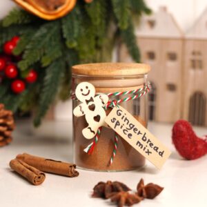 Gingerbread spice mix jar in a Christmas themed background